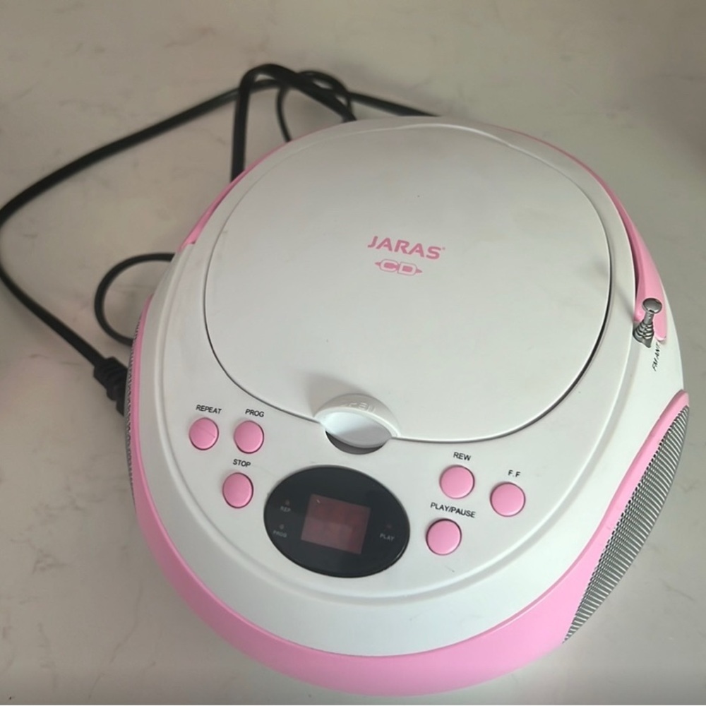 Pink and White Portable CD Player